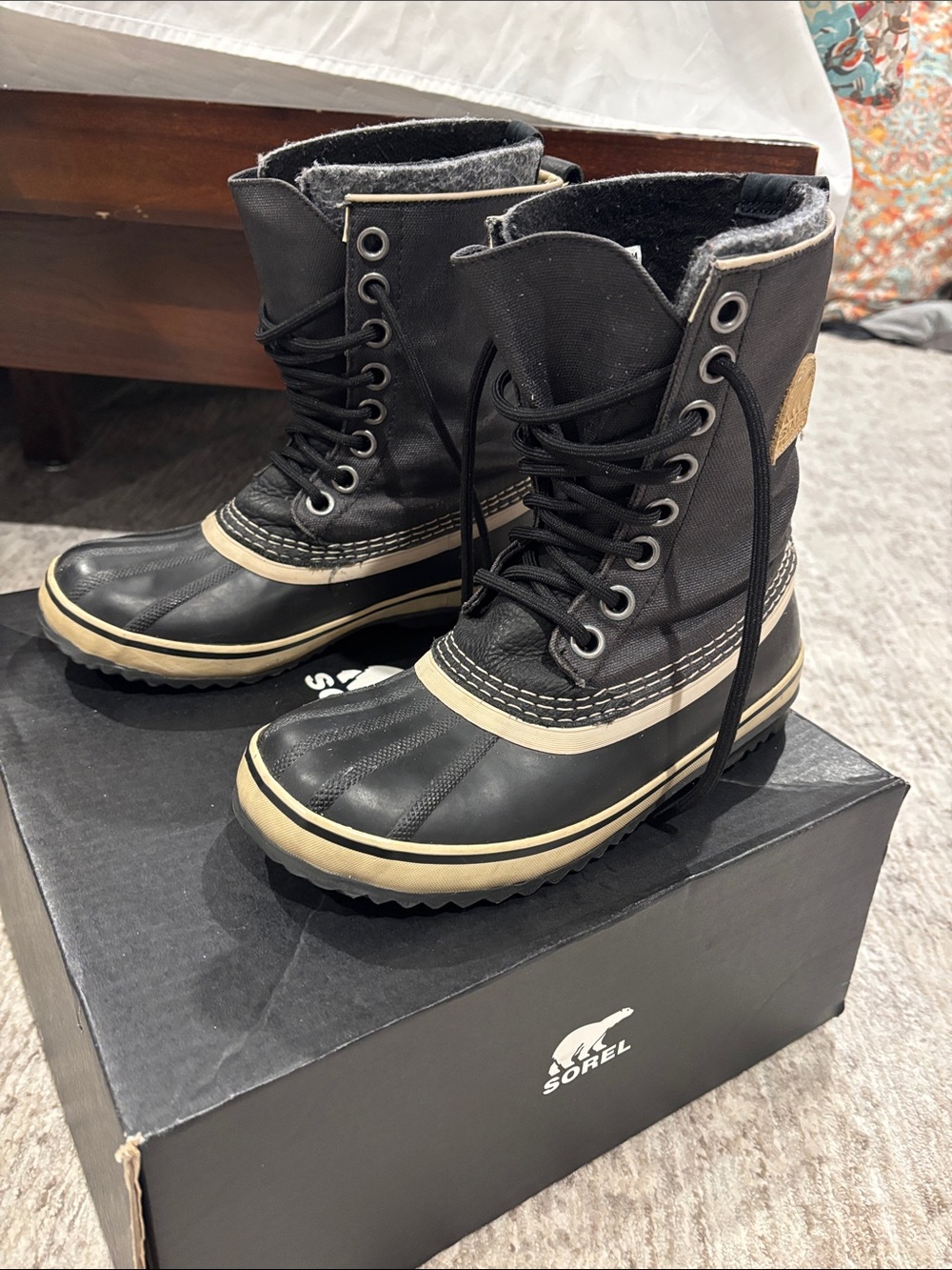 Sorel Women’s Black and Cream Winter Lace-Up Boots